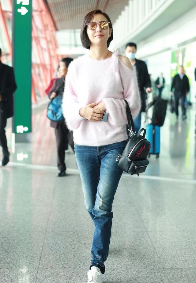 原来长裤还能这么穿,佟丽娅搭配方式太巧妙,常服也能穿出高级感