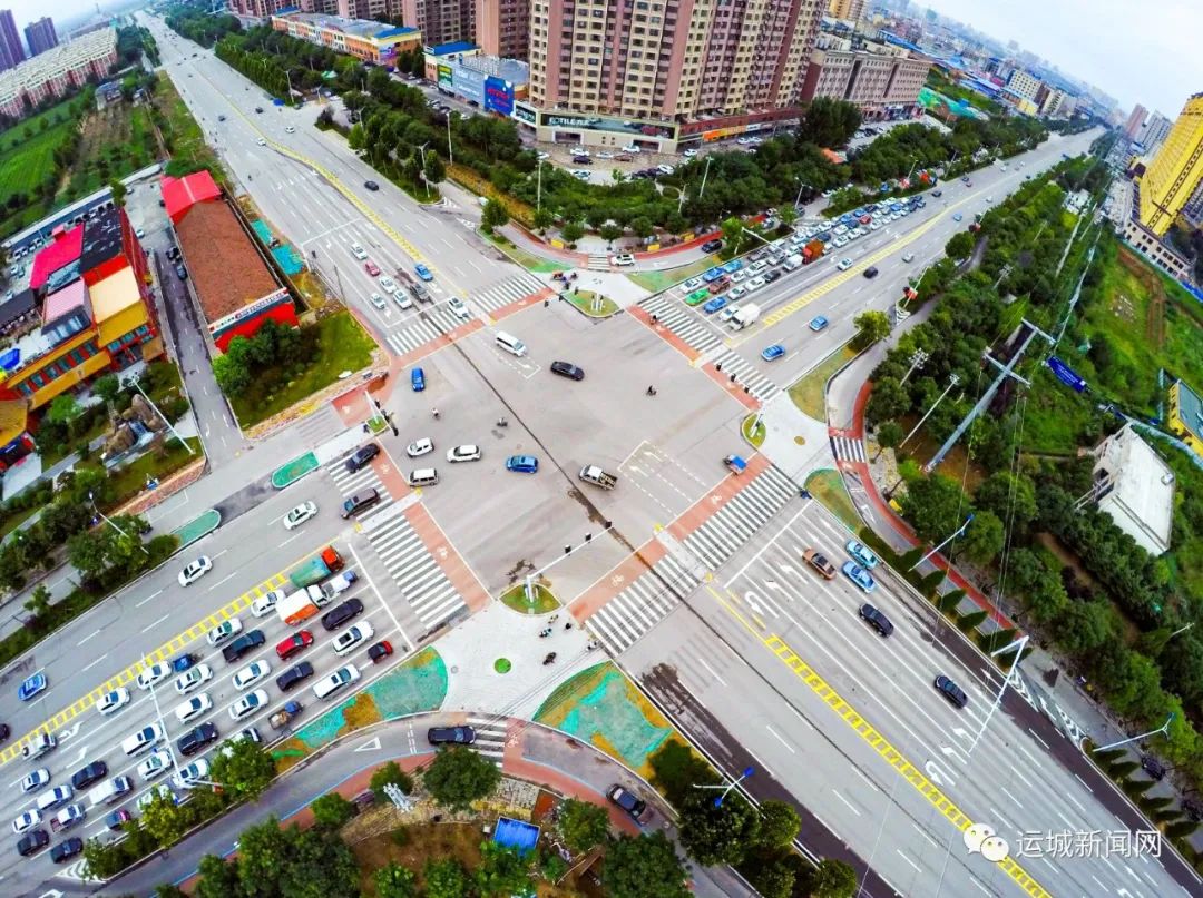 我市首个新型渠化岛建成投用!安装首个非机动车交通指示灯